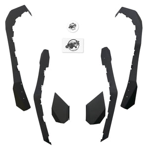 Dramatic hero shot of the Arctic Cat Wildcat XX combo kit, showcasing the robust MudBusters rear fender flares and roost flaps for optimal mud and debris protection