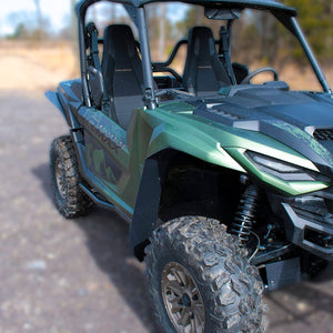 Yamaha Wolverine RMAX2 1000 with Mudbusters Mud-Lite Coverage fender flares shown installed front and rear from driver side perspective. 