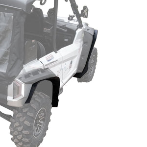 Behind side view of MudBusters RMAX 4 max coverage OEM fender extensions, showcasing the impressive design and superior protection for the ultimate off-road experience.