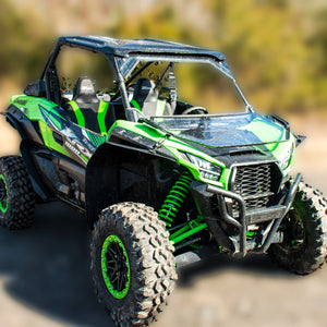MudBusters Max Coverage Fender Flares for the Kawasaki Teryx KRX 1000. View is looking at the passenger side of the UTV with the front and back fender flares installed