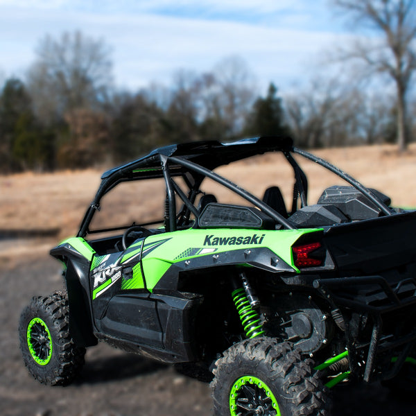 MudBusters Front and Rear Racelite Fender Flares for Kawasaki Teryx KRX 1000 installed, view is from looking at the drivers side of the UTV. 